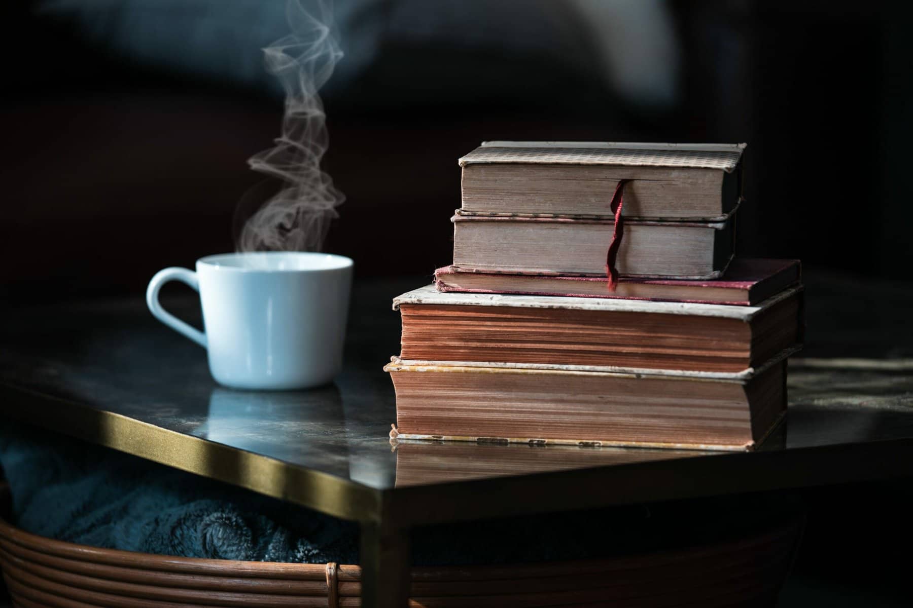 Old books and cup of coffee