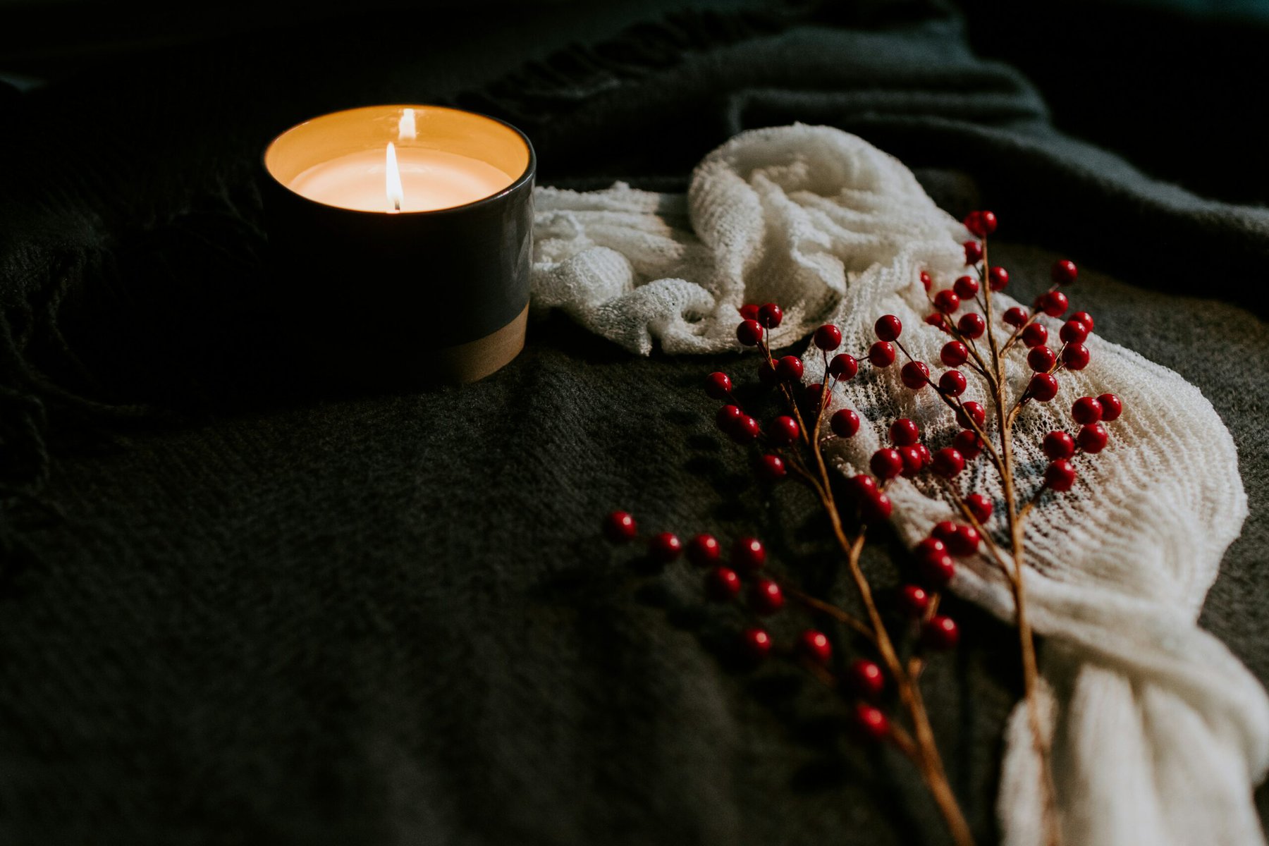 Hygge setting with candle and berries